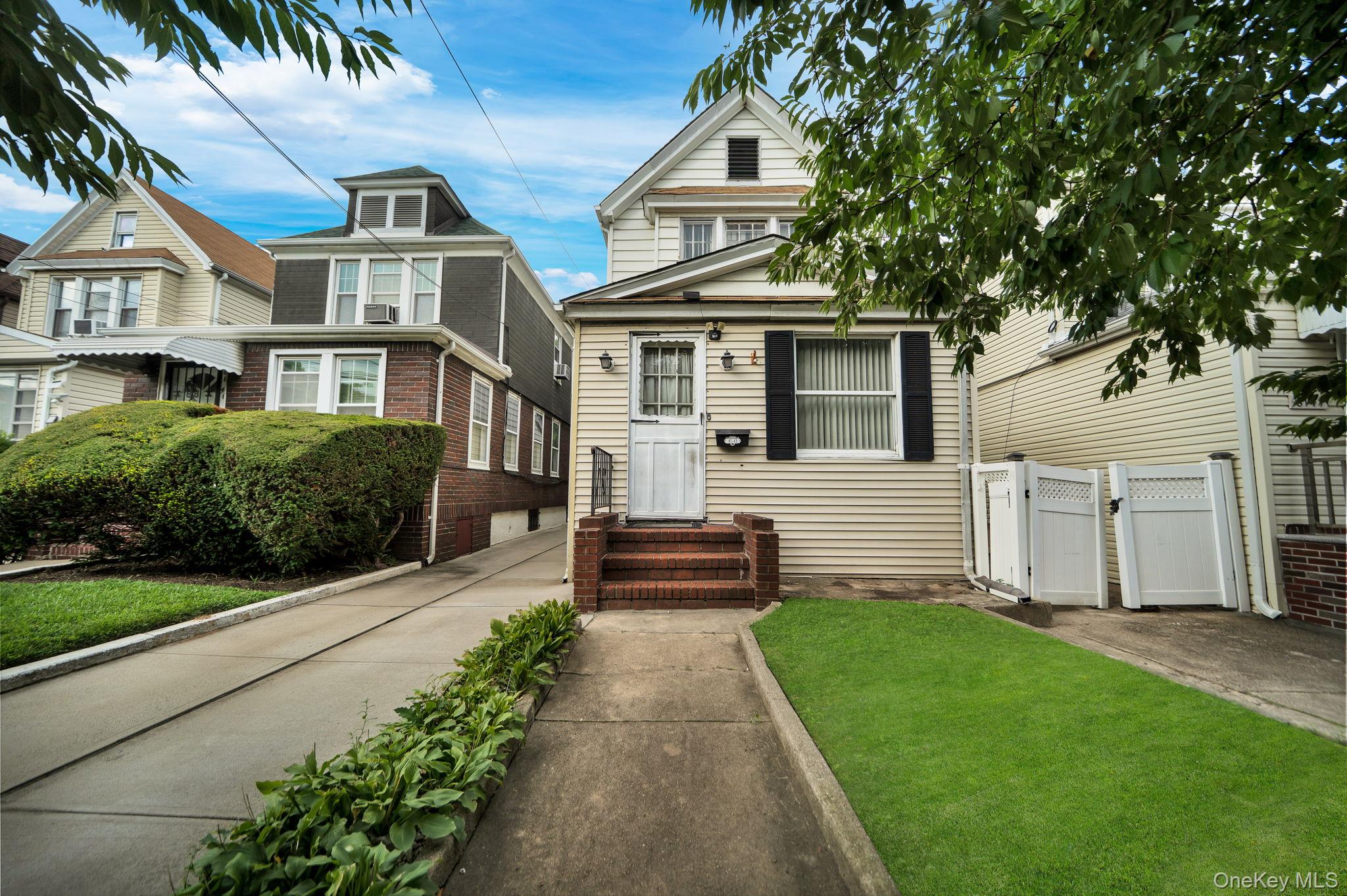 3 bed, 1 bath bank-owned foreclosure at 61-43 Wetherole Street, Rego Park, NY — Queens County Long Island listing photo