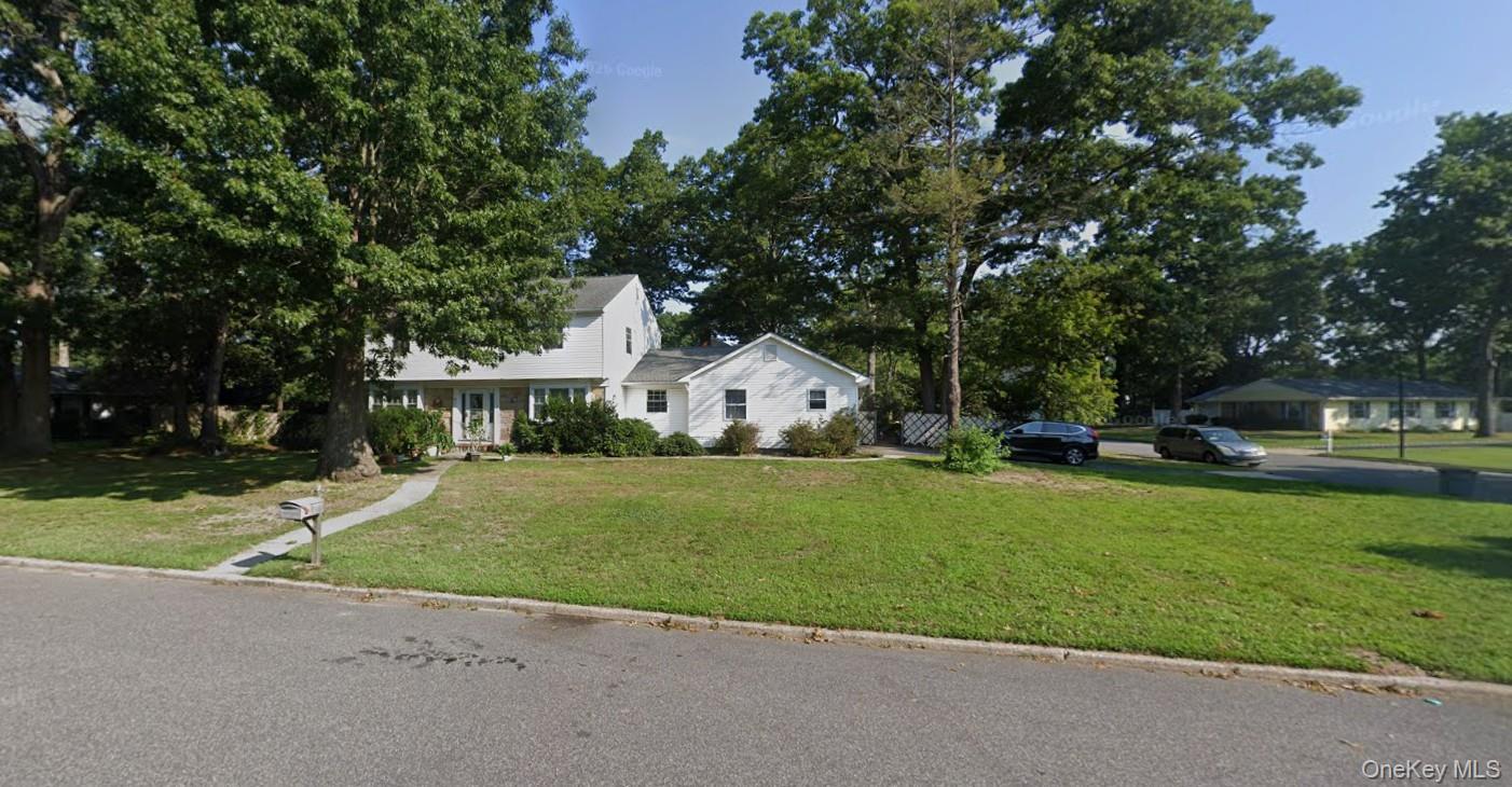 4 bed, 3 bath short sale at 27 Whitmore Lane, Coram, NY — Suffolk County Long Island listing photo