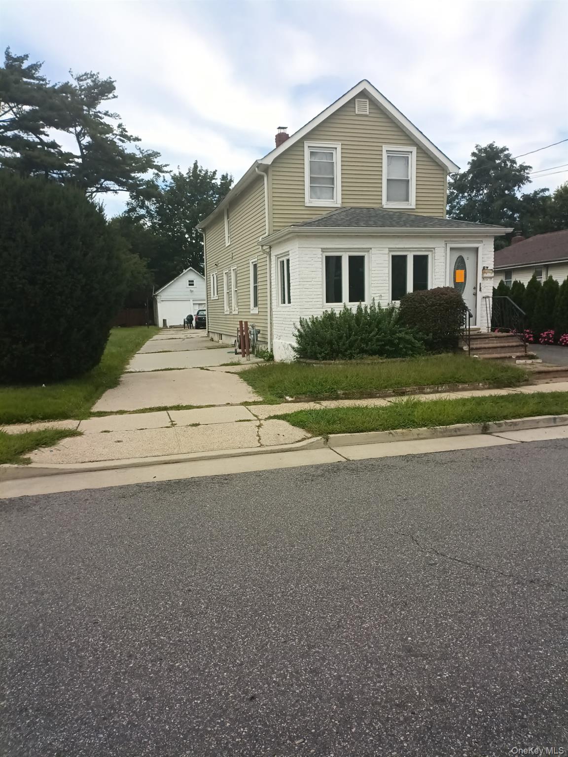 3 bed, 2 bath short sale at 57 Robinwood Avenue, Hempstead, NY — Nassau County Long Island listing photo