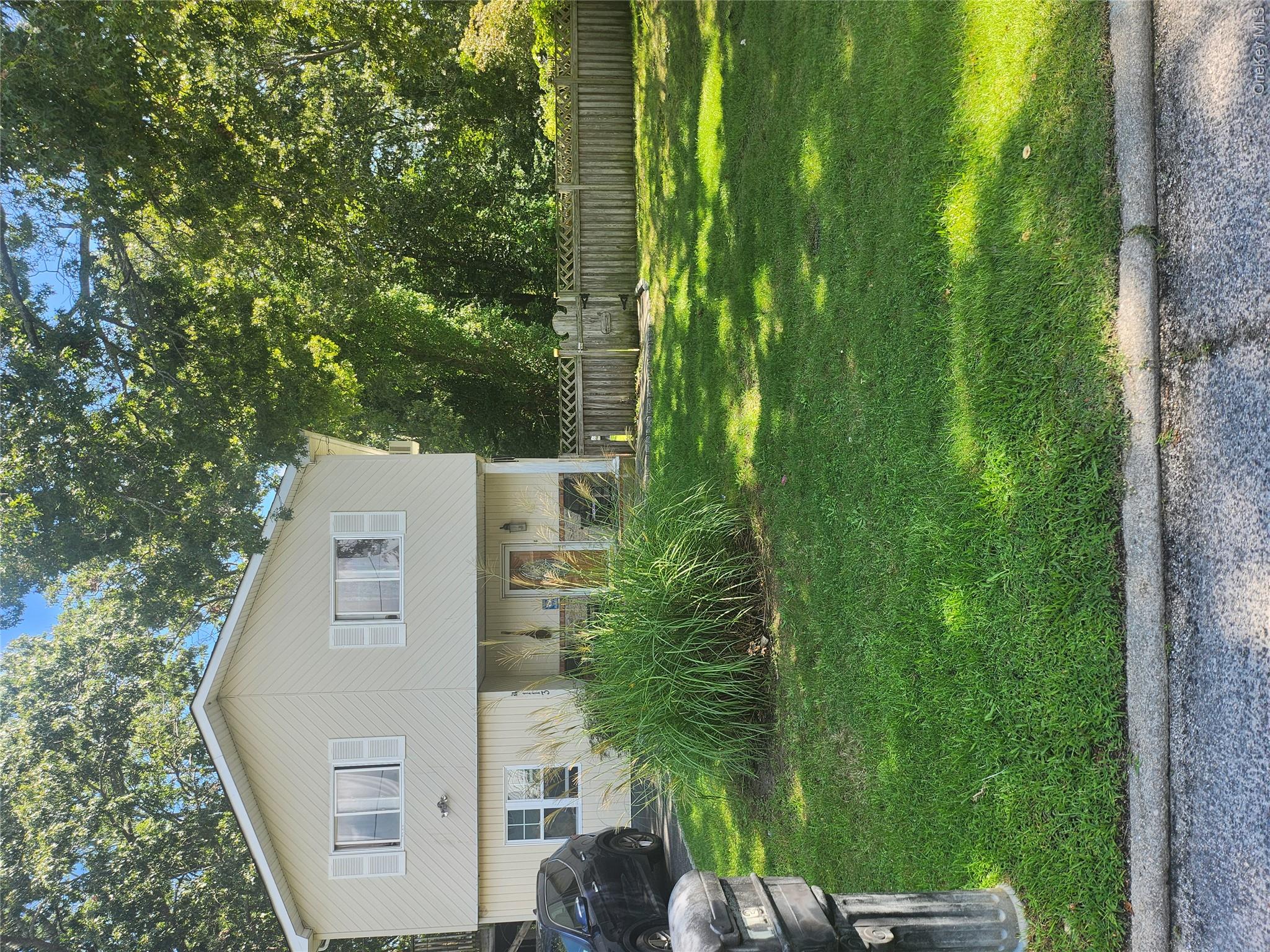 3 bed, 2 bath short sale at 113 Montgomery Avenue, Mastic, NY — Suffolk County Long Island listing photo
