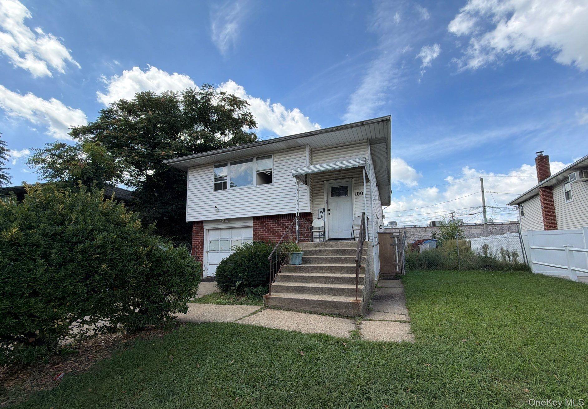 4 bed, 2 bath auction property at 1008 Ditmas Avenue, Uniondale, NY — Nassau County Long Island listing photo