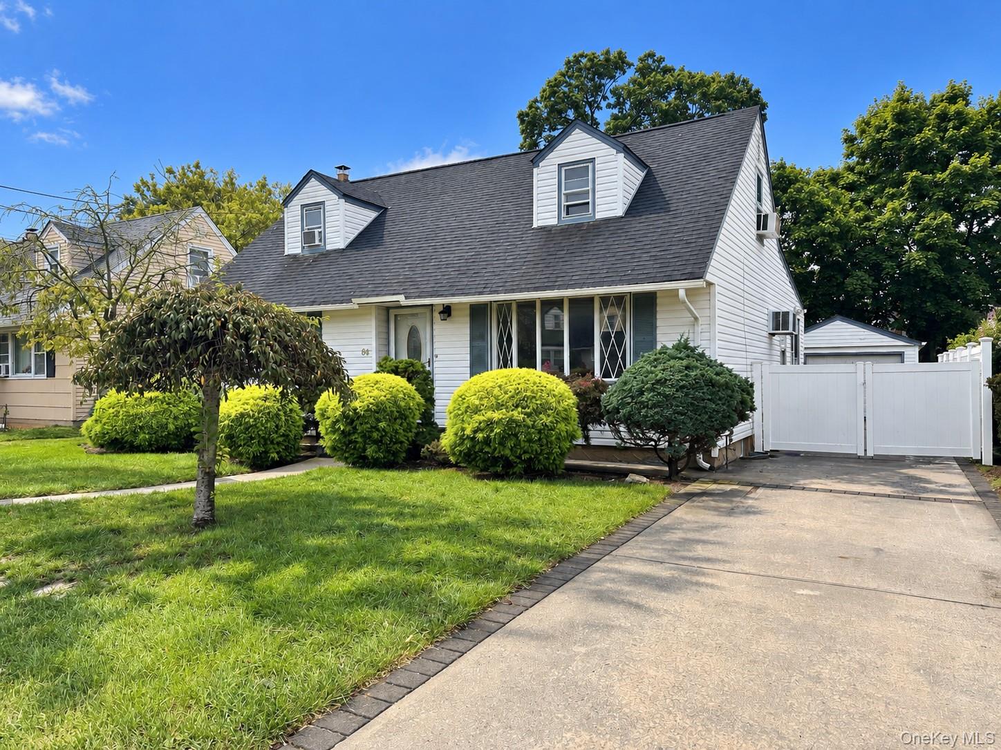 4 bed, 2 bath estate sale at 64 Fenimore Street, Valley Stream, NY — Nassau County Long Island listing photo