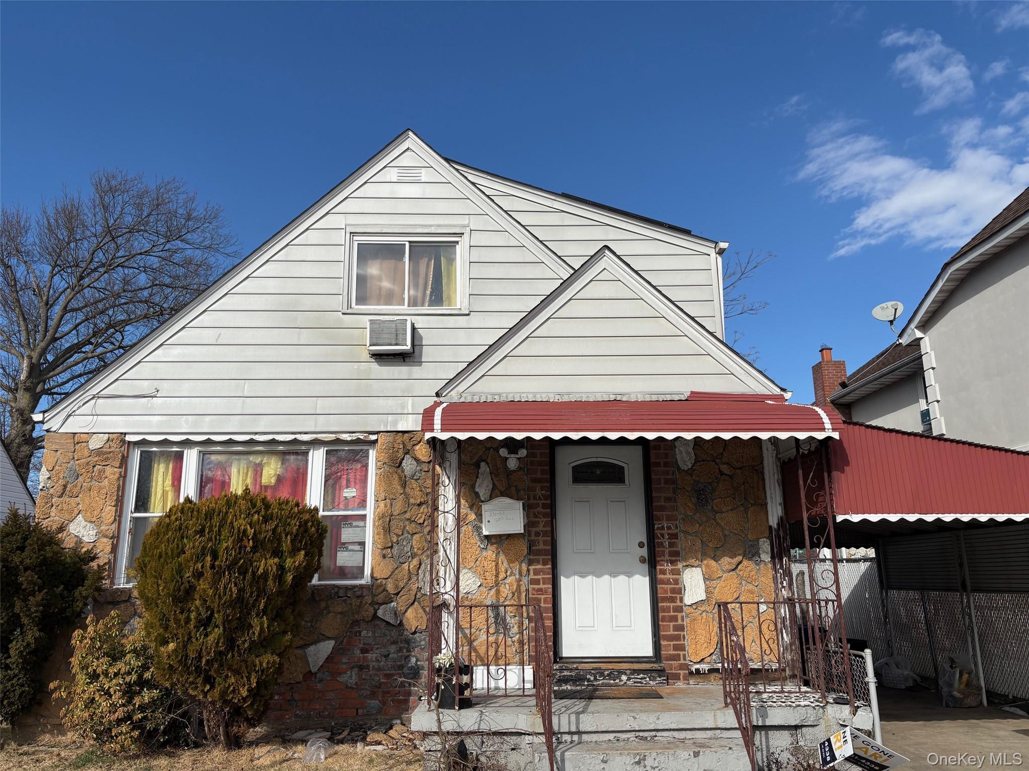 4 bed, 2 bath auction property at 231-37 128th Road, Laurelton, NY — Queens County Long Island listing photo