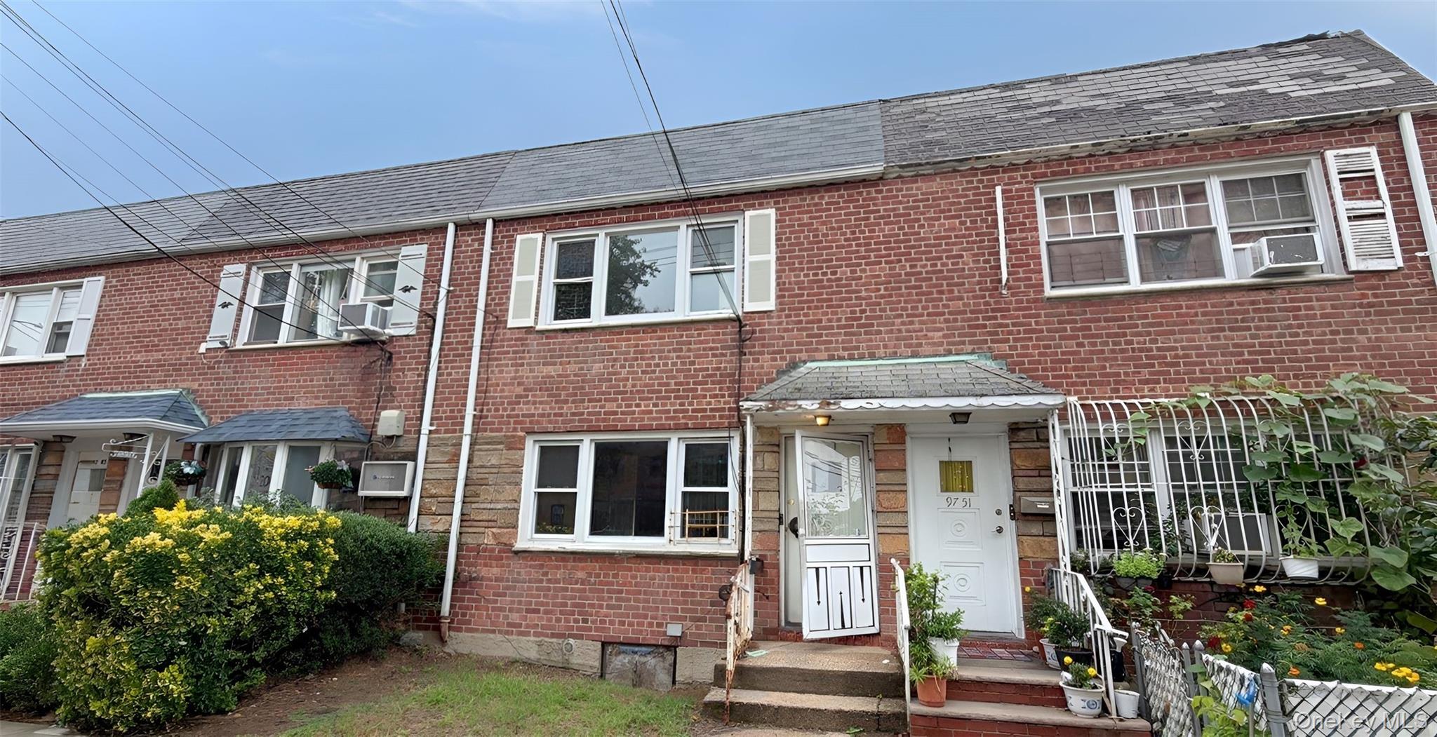 4 bed, 2 bath estate sale at 97-49 91st Street, Ozone Park, NY — Queens County Long Island listing photo