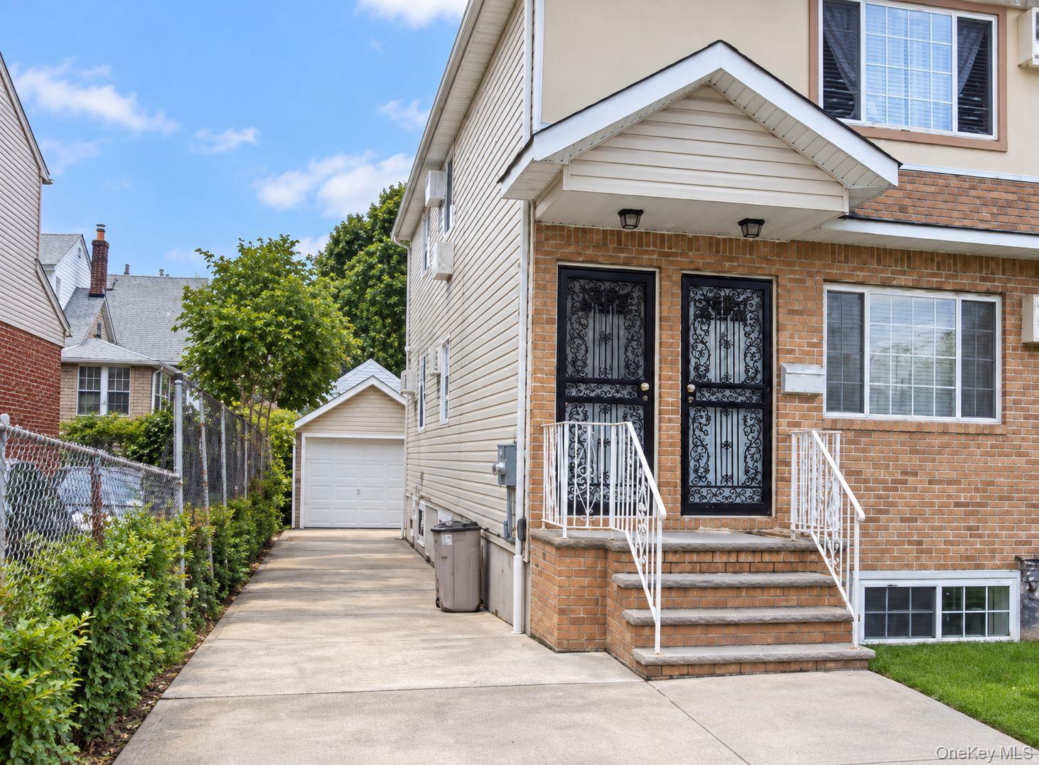 6 bed, 3 bath short sale at 11836 Guy R Brewer Boulevard, Jamaica, NY — Queens County Long Island listing photo