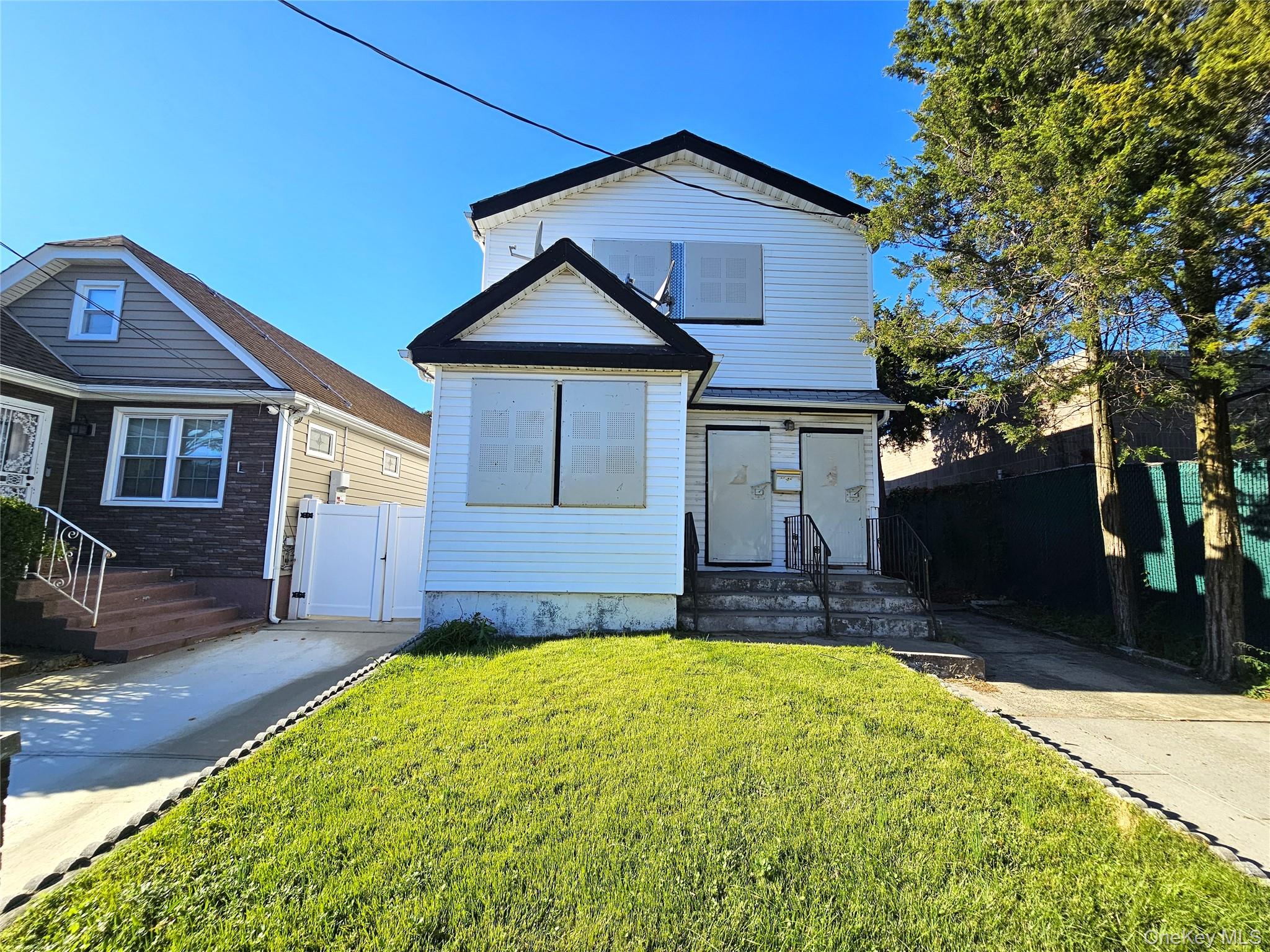 6 bed, 2 bath estate sale at 161-33 128th Avenue, Jamaica, NY — Queens County Long Island listing photo